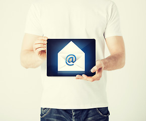 Image showing man holding tablet pc with email sign