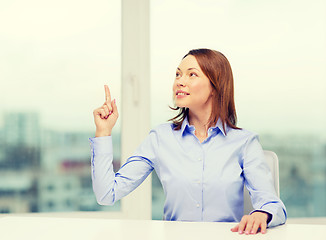 Image showing attractive businesswoman at office