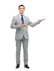 Image showing happy smiling businessman in suit