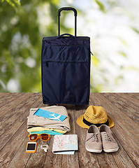 Image showing travel bag and personal stuff for vacation