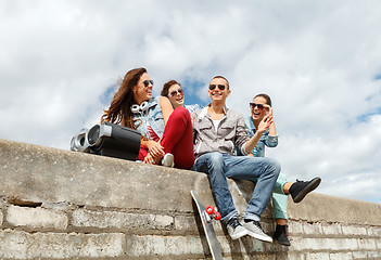 Image showing group of smiling teenagers hanging out