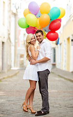 Image showing couple with colorful balloons