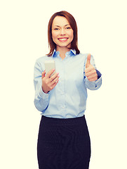 Image showing young smiling businesswoman with smartphone