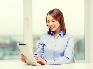 Image showing smiling businesswoman or student with tablet pc