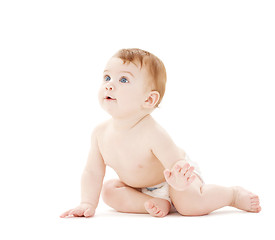 Image showing crawling curious baby