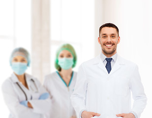 Image showing smiling male doctor in white coat