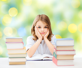 Image showing happy student girl with books at school