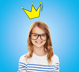 Image showing smiling little girl with black eyeglasses