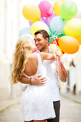 Image showing couple with colorful balloons