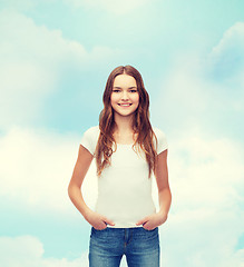 Image showing smiling teenager in blank white t-shirt