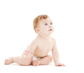 Image showing crawling curious baby