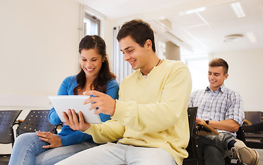 Image showing group of smiling students with tablet pc