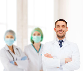 Image showing smiling male doctor in white coat