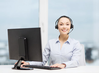 Image showing friendly female helpline operator