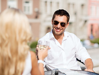 Image showing couple drinking wine in cafe