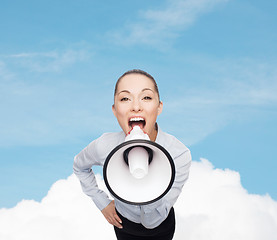 Image showing screaming businesswoman with megaphone