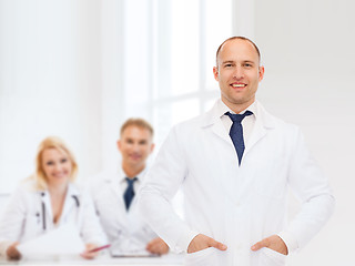 Image showing smiling male doctor in white coat