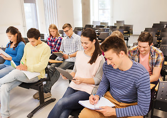 Image showing group of smiling students with tablet pc