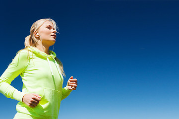 Image showing woman doing running outdoors