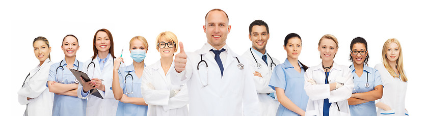 Image showing group of smiling doctors with showing thumbs up