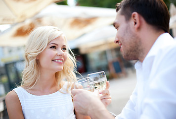 Image showing couple drinking wine in cafe