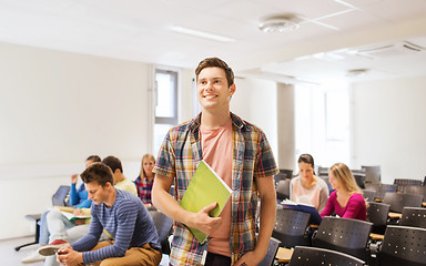 Image showing group of smiling students in lecture hall