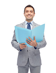 Image showing happy businessman with open folder