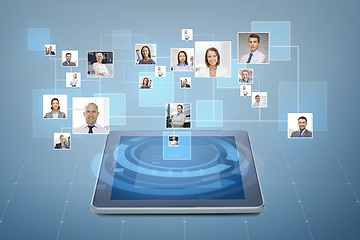 Image showing pictures of businesspeople over tablet pc