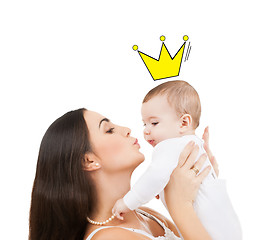 Image showing happy mother kissing and holding baby