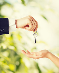 Image showing man and woman with house keys