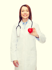 Image showing smiling female doctor with heart and stethoscope