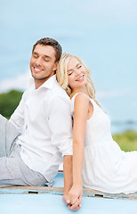 Image showing smiling couple at sea side