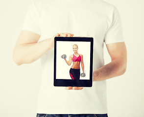 Image showing man with tablet pc and sporty woman