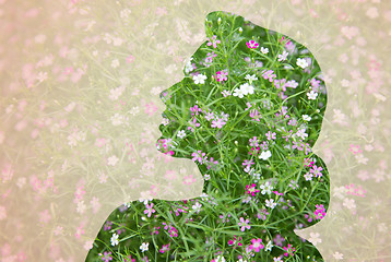 Image showing woman silhouette with green floral pattern