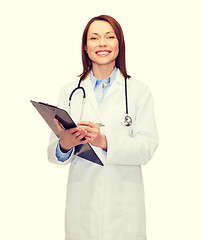 Image showing smiling female doctor with clipboard