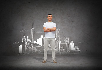 Image showing smiling man over city sketch background