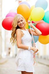Image showing woman with colorful balloons