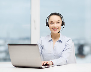 Image showing friendly female helpline operator