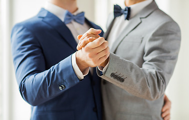 Image showing close up of happy male gay couple dancing