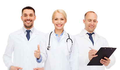 Image showing group of doctors showing thumbs up over white