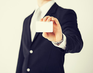 Image showing man hand with blank paper