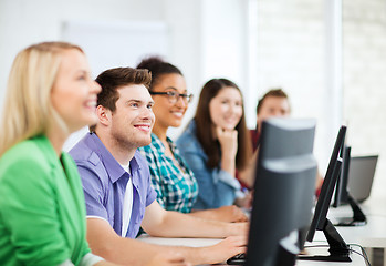 Image showing students with computers studying at school