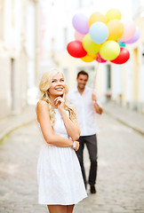 Image showing couple with colorful balloons