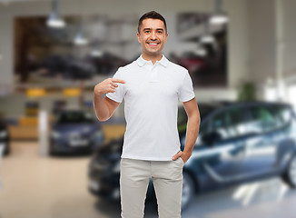 Image showing smiling man in t-shirt pointing finger on himself