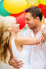 Image showing couple with colorful balloons