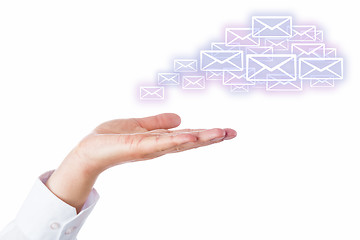 Image showing Email Cloud Leaving The Palm Of A Hand On White