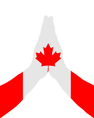 Image showing Canadian praying