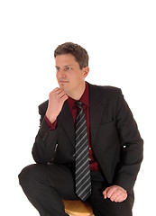Image showing Young businessman thinking.
