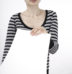 Image showing Woman holding a paper