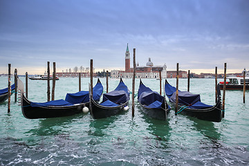 Image showing San Giorgio Maggiore church with moored gondolas